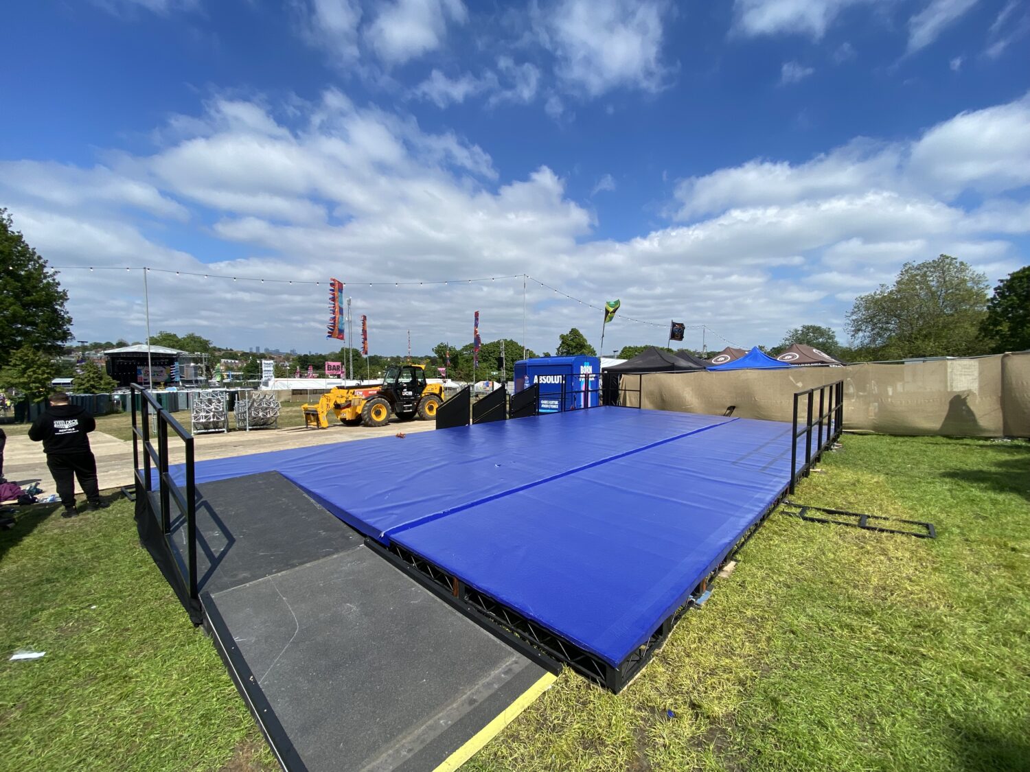 festival activation stage with protective matting