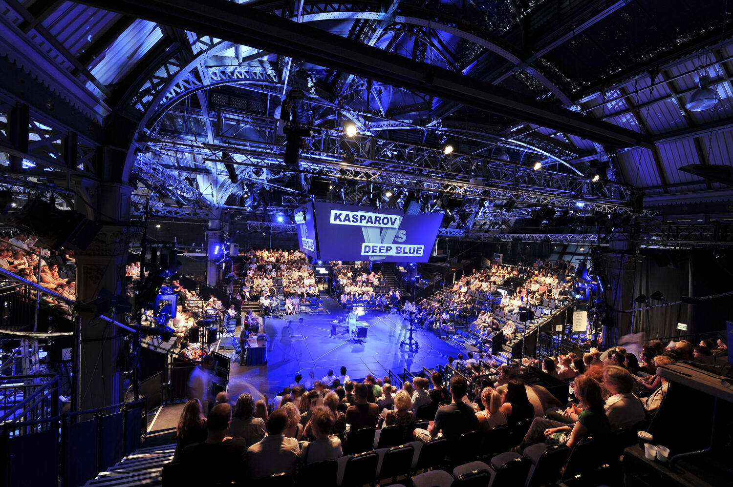 tiered seating around a central stage